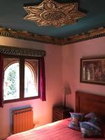 Posteľ alebo postele v izbe v ubytovaní Casa Jardín Oriental