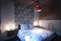 Łóżko lub łóżka w pokoju w obiekcie Suite Factory : gîte de charme en Avesnois