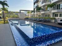 Bazén v ubytování Mantra Condo Mae Phim MB217 with 2 bed room nebo v jeho okolí
