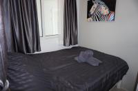 Postel nebo postele na pokoji v ubytování Mantra Condo Mae Phim MB217 with 2 bed room