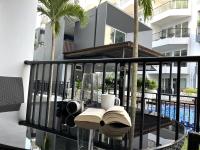 Bazén v ubytování Mantra Condo Mae Phim MB217 with 2 bed room nebo v jeho okolí