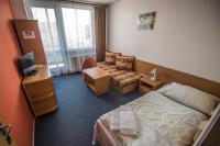 Postel nebo postele na pokoji v ubytování Hotel Sport