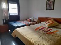 A bed or beds in a room at Deltebre Riu