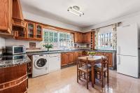 Kuchyň nebo kuchyňský kout v ubytování Villa Maria Isabel