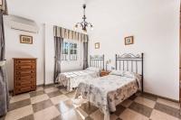 Postel nebo postele na pokoji v ubytování Villa Maria Isabel