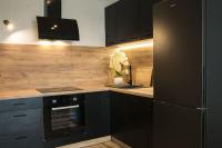 Kuchyňa alebo kuchynka v ubytovaní Apartament Nowa Grunwaldzka