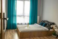 Posteľ alebo postele v izbe v ubytovaní Apartament Nowa Grunwaldzka