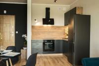 Kuchyňa alebo kuchynka v ubytovaní Apartament Nowa Grunwaldzka