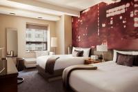 Hyatt Grand Central New Yorkにあるベッド