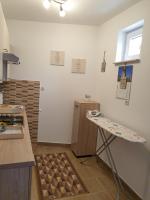 Kuchyňa alebo kuchynka v ubytovaní Apartman SAN