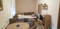 Posteľ alebo postele v izbe v ubytovaní Apartman SAN