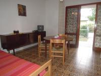 A television and/or entertainment centre at Wonderful Villa in a quiet place in Bibione