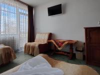 Postel nebo postele na pokoji v ubytování Guest Rooms Grachenovi