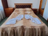 Postel nebo postele na pokoji v ubytování Guest Rooms Grachenovi