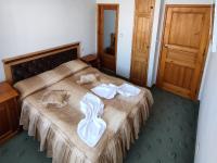 Postel nebo postele na pokoji v ubytování Guest Rooms Grachenovi