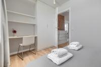 Łóżko lub łóżka w pokoju w obiekcie Apartamenty MUNN 6 Szczecin