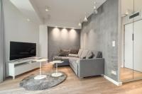 Telewizja i/lub zestaw kina domowego w obiekcie Apartamenty MUNN 6 Szczecin