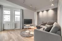 Telewizja i/lub zestaw kina domowego w obiekcie Apartamenty MUNN 6 Szczecin