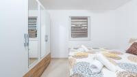Posteľ alebo postele v izbe v ubytovaní Apartment Vinko