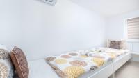 Posteľ alebo postele v izbe v ubytovaní Apartment Vinko