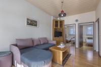 Televízia a/alebo spoločenská miestnosť v ubytovaní Bungalow Pintar