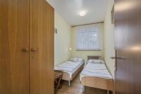 Posteľ alebo postele v izbe v ubytovaní Bungalow Pintar