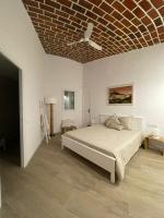 Postel nebo postele na pokoji v ubytování Cap Sa Sal suites -Apartament Begur - Costa Brava
