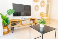 TV a/nebo společenská místnost v ubytování Casa del Carmen - Terraza y Paseo Marítimo