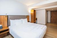Ein Bett oder Betten in einem Zimmer der Unterkunft La Quinta by Wyndham Time Square South
