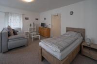 Postel nebo postele na pokoji v ubytování Apartmá u Baštů