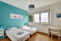 Posteľ alebo postele v izbe v ubytovaní Le Tangon - Maison de 150m2 face à la mer