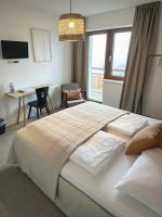 Cama o camas de una habitación en Hotel Der Drahtesel