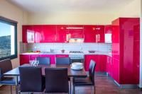 A kitchen or kitchenette at Villa Rigani