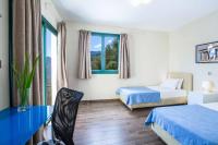A bed or beds in a room at Villa Rigani