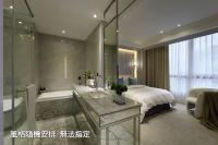 a bathroom with a bed and a tub and a sink at Boda Hotel in Taichung