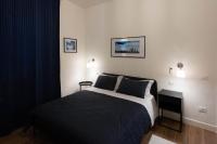 A bed or beds in a room at B&B Porta 93