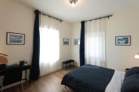 A bed or beds in a room at B&B Porta 93