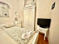 Posteľ alebo postele v izbe v ubytovaní Vintage Apartment at Basilica