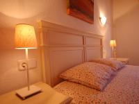 Posteľ alebo postele v izbe v ubytovaní LETS HOLIDAYS Cozy Apartment Near to the Castle
