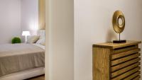 Posteľ alebo postele v izbe v ubytovaní President Apartment with Sauna