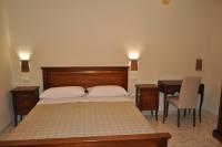 A bed or beds in a room at Terrae Tiferni