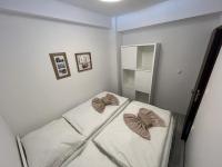 A bed or beds in a room at LUX apartmany Romantika CHOPOK 7, 19
