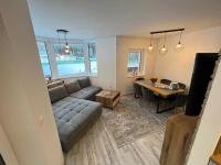 A television and/or entertainment centre at LUX apartmany Romantika CHOPOK 7, 19