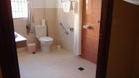 a bathroom with a toilet and a shower at Hotel Catalán Puerto Real in Puerto Real