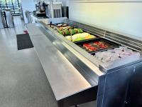 een buffet met veel verschillende soorten eten bij Leichhardt Accommodation in Moranbah