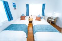 Nagashima Riverside Resort 1にあるベッド