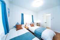 Nagashima Riverside Resort 1にあるベッド