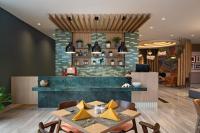 Posezení v ubytování MaxOneHotels at Kota Harapan Indah-Bekasi