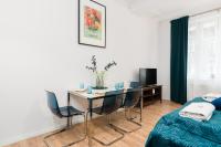 Łóżko lub łóżka w pokoju w obiekcie Kwiatowa Apartments Poznań City Center by Noclegi Renters
