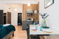 Kuchnia lub aneks kuchenny w obiekcie Kwiatowa Apartments Poznań City Center by Noclegi Renters